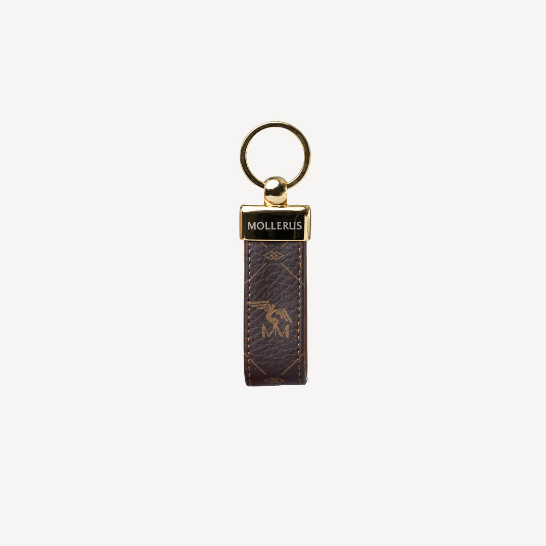 RIGI | Schlüsselanhänger Pecarus braun beige/gold - front